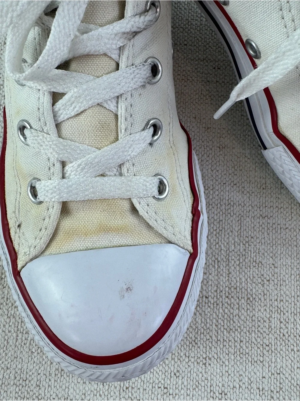 Converse youth size 3 Low Top Canvas Sneakers in Off-White with Red Trim
